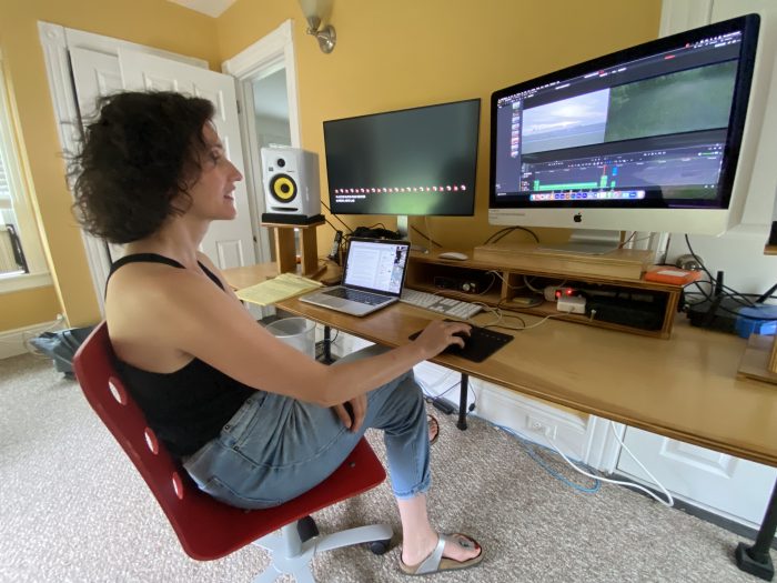 Elwira editing film on computer