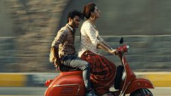Still of the two protagonists riding a motor bike in the film JOYLAND